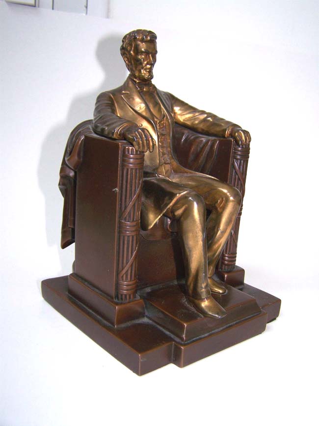 A Single Antique Bookend circa 1950 depicting Abraham Lincoln 'sitting in the chair' at the Lincoln Memorial.